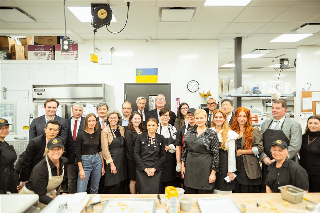 Veselka team and Diplomats posing in their Williamsburg Kitchen