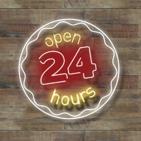 Open 24 hours neon sign on a wooden background 