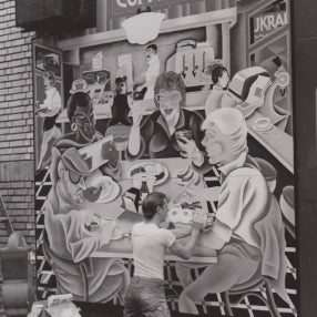 Arnie the muralist redoing a mural for Veselka in 1996, black and white 