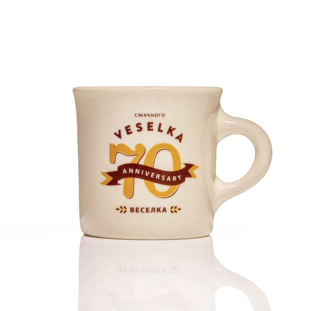 Anniversary mug with 70th anniversary logo 