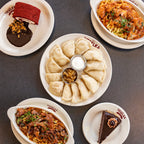 Pierogi, pyana vsyhna, chicken paprikash, beef stroganoff, and red velvet roulade all on plates. Finals Care package