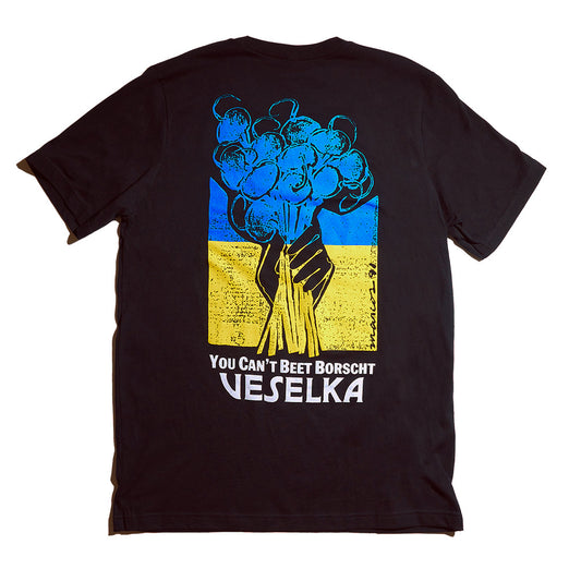 Black t-shirt back side with illustration hand holding a bunch of beets in Ukrainian colors. Phrase on the bottom says "You cant Beet Borscht , Veselka" 