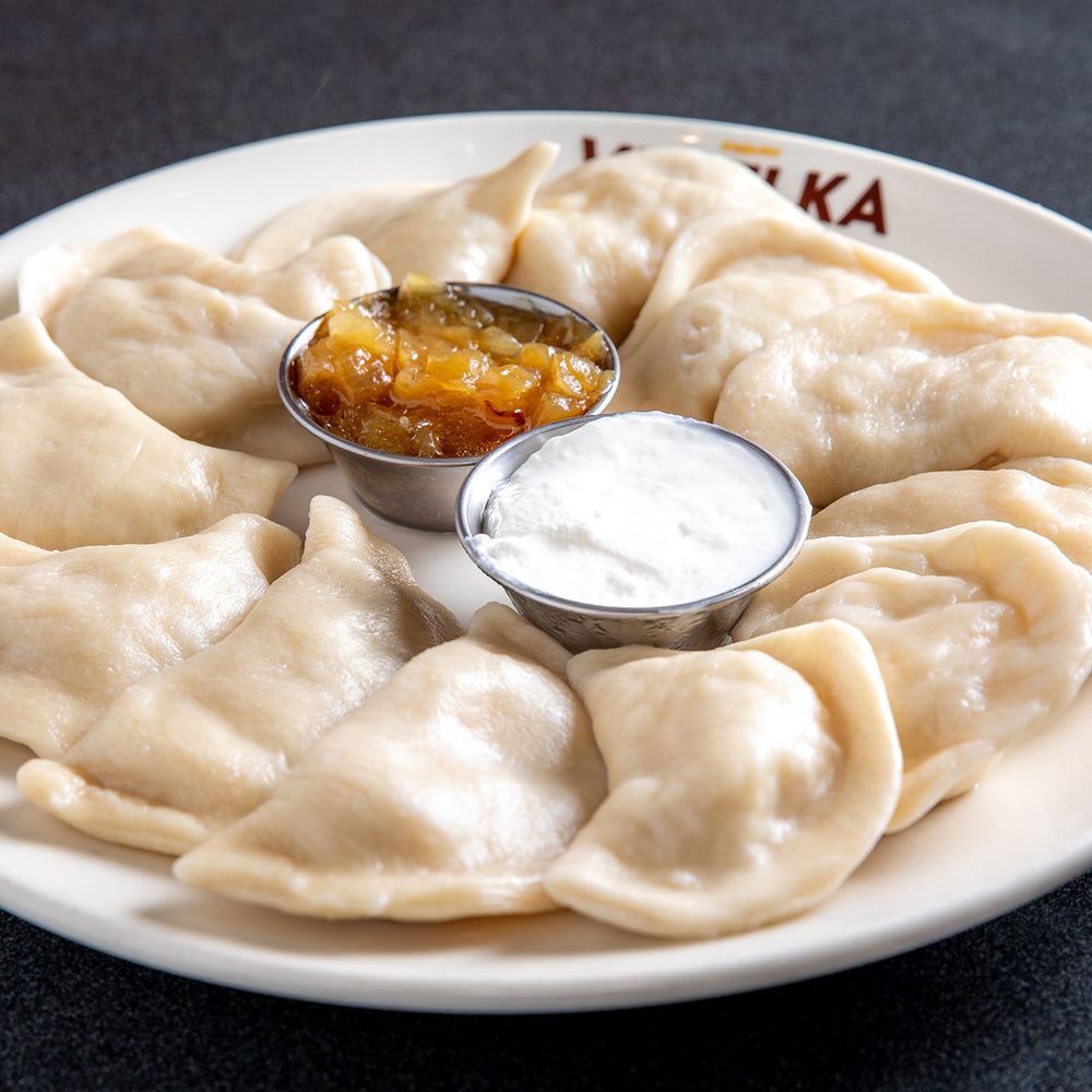 More pierogi on a plate boiled - Finals care package