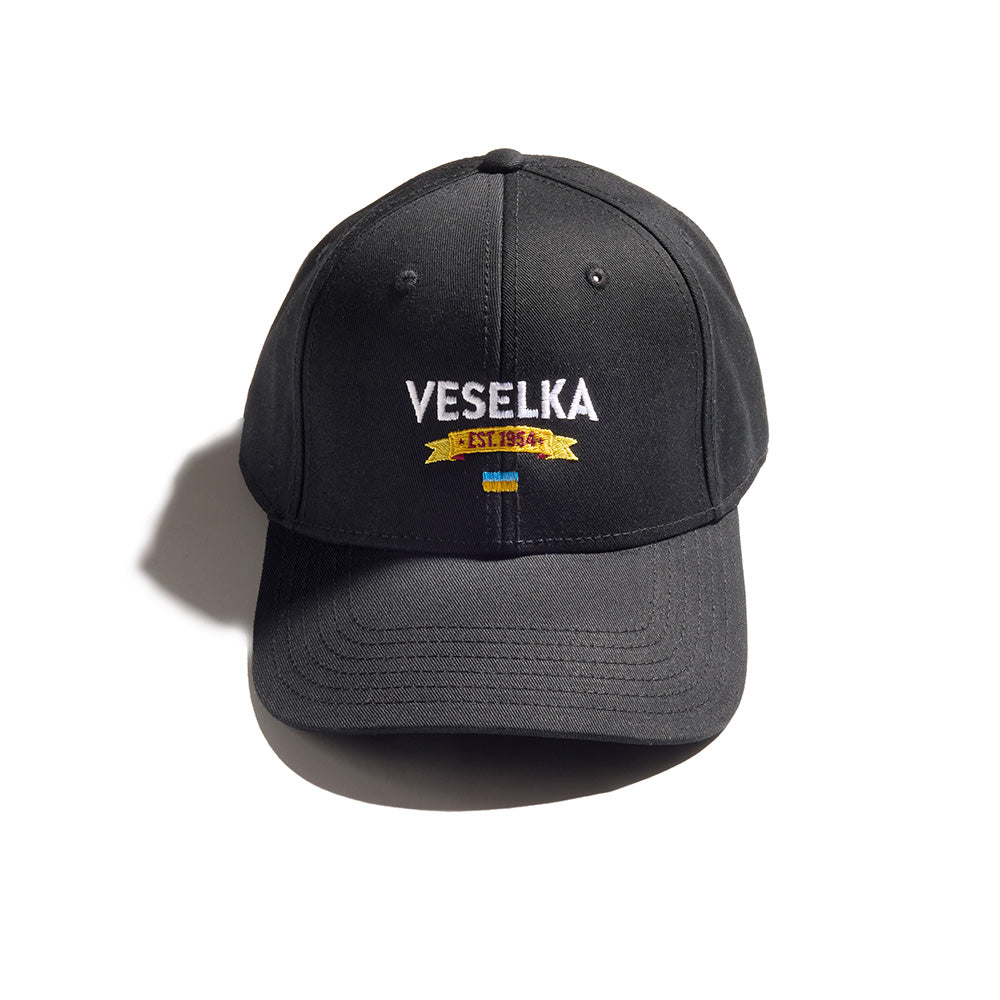 Black baseball cap with Veselka logo and small Ukrainian flag 