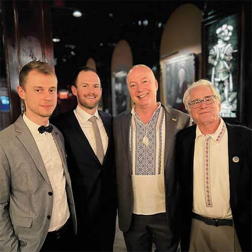 Jason, Justin, Vitalii, Tom celebrating at the rise awards in 2023