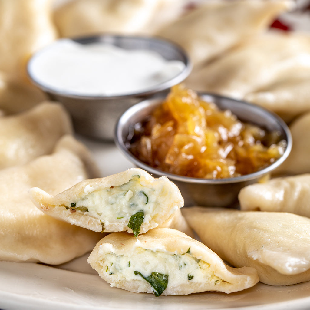 The Essential Ukrainian Dinner - Arugula and Goat Cheese Pierogi 